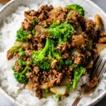 Ground beef and broccoli stir-fry with garlic ginger sauce served over rice.