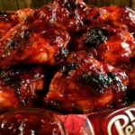 Grilled chicken with Cherry Dr Pepper BBQ sauce served on a plate
